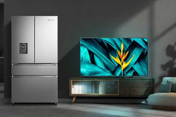 A Hisense TV and a multi-door fridge freezer in a lifestyle setting.